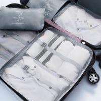 四万公里 SW1016 收纳袋套装 7件套 灰色（单位：套）平口袋27x15.5cm+杂物袋29x22x10cm+鞋子袋34x20cm+衣物袋S 31x21x10cm+束口袋35x26.5cm+衣物袋M 33x25.5x11.5cm+衣物袋